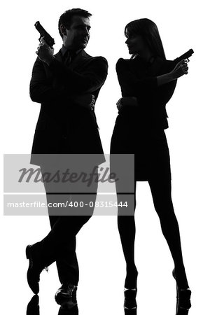 one  man detective secret agent criminal with gun in silhouette studio isolated on white background