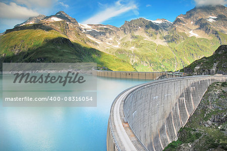 blue water tank with a concrete dam