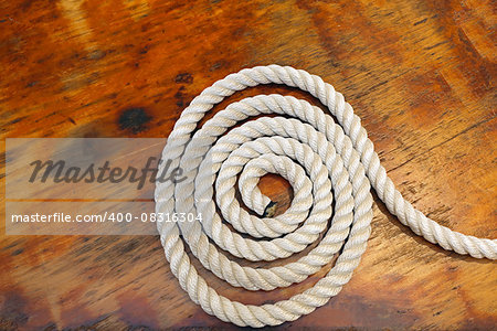 Coil of Rope at Wooden Boat Deck
