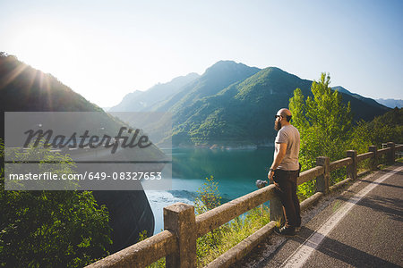 Man enjoying view of Lake Garda, Italy