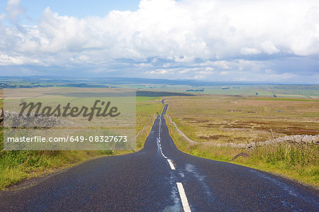 Diminishing perspective of rural road, Cumbria, UK