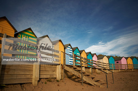 Row of colourful beachhuts, Bude, Cornwall, UK