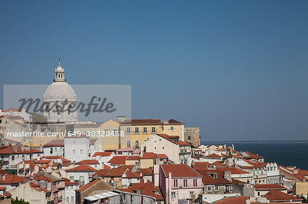 Hillside cityscape at coast, Lisbon, Portugal