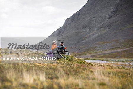 Hikers resting in mountains