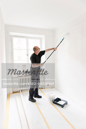 Man painting room