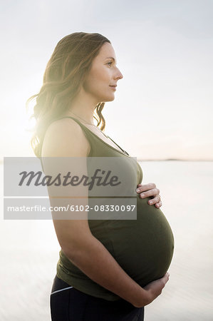 Pregnant woman looking away