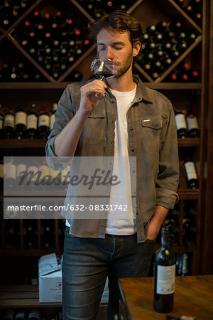 Sommelier sniffing glass of wine Sommelier sniffing glass of wine