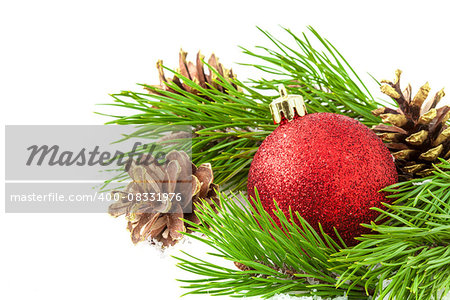 Christmas red ball on white background with snow.