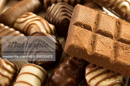 selection of chocolated sweet pralines close up