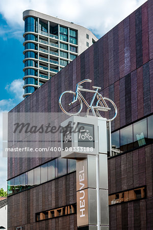 Eindhoven, Netherlands - May 24, 2015: Bicycle parking sign in Eindhoven city center. Eindhoven is one of the five nominees to become best Cycling City of the Netherlands in 2014