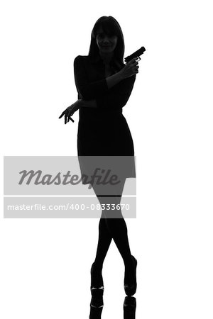 one  sexy detective woman holding aiming gun in silhouette studio isolated on white background