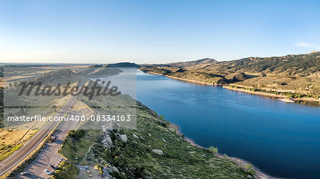 aerial panorama of southern part of the Horsetooth Reservoir near Fort Collins, Colorado, late summer scenery with a trailhead and parking