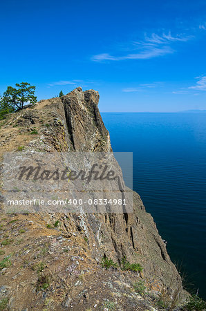 The steep rocky coast of the northern tip of the island of Olkhon. Lake Baikal, Russia.