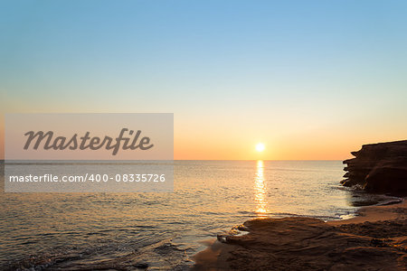 Ocean coast at the sunrise (Central Coastal Drive, Prince Edward Island, Canada)