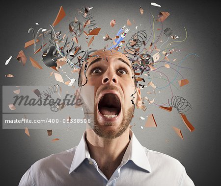 Stressed businessman with broken mechanism head screams