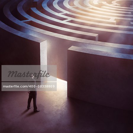 Businessman at the entrance a circular maze