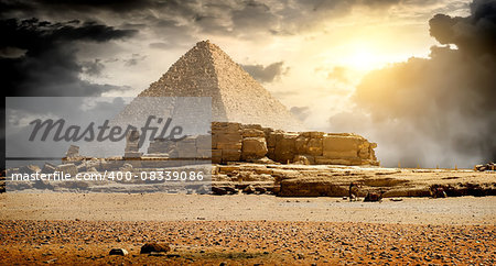 Storm clouds over pyramid of Cheops in Giza