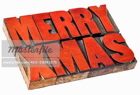 Merry Christmas  (Xmas) - isolated  word abstract in vintage letterpress wood type stained by red ink