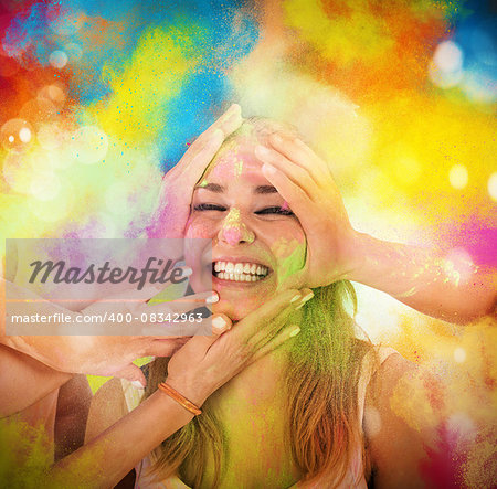 Girl laugh and playing with colored powders