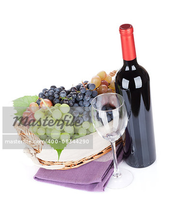 Red wine bottle and grapes. Isolated on white background