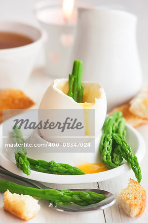 Soft boiled eggs with asparagus and toast soldiers