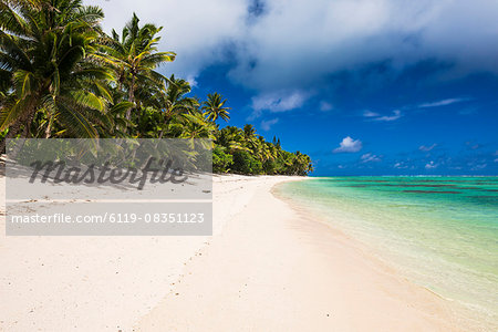 White sandy beach and palm trees on tropical Rarotonga Island, Cook Islands, South Pacific, Pacific