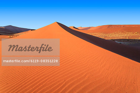 Shadow and light among the sand dunes shaped by wind, Deadvlei, Sossusvlei, Namib Desert, Namib Naukluft National Park, Namibia, Africa