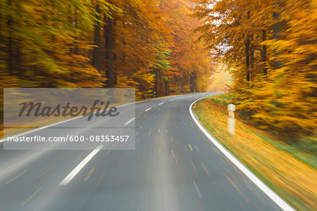 Road View from a Scenic Route in Autumn Forest, Spessart, Franconia, Bavaria, Germany Road View from a Scenic Route in Autumn Forest, Spessart, Franconia, Bavaria, Germany