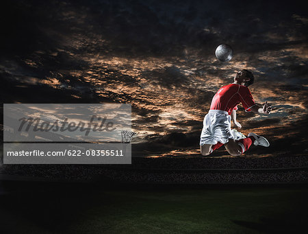 Soccer player in dramatic action