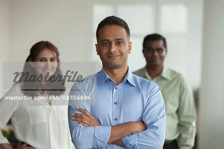 Singapore, Three business people standing in office