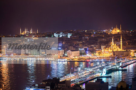 Istanbul at night, with Blue Mosque on left, New Mosque on right and Galata Bridge across Golden Horn, Turkey, Europe Istanbul at night, with Blue Mosque on left, New Mosque on right and Galata Bridge across Golden Horn, Turkey, Europe