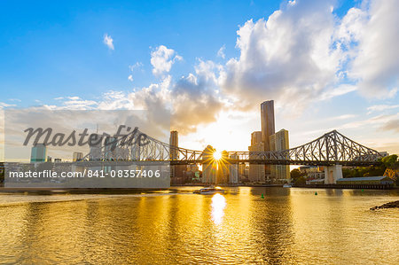 Sunset, Brisbane city with the sun hidden behind the Story Bridge, Brisbane, Queensland, Australia, Pacific