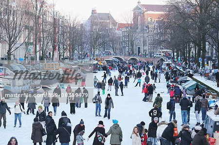 People ice skating in Amsterdam, Netherlands