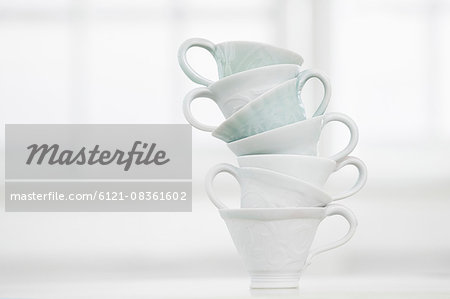 Close-up of stack of white cups, Bavaria, Germany Close-up of stack of white cups, Bavaria, Germany
