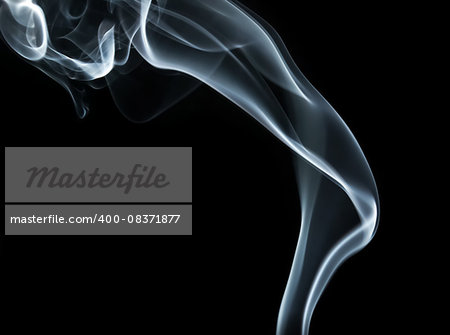 Abstract smoke wave on black background. Studio shot.