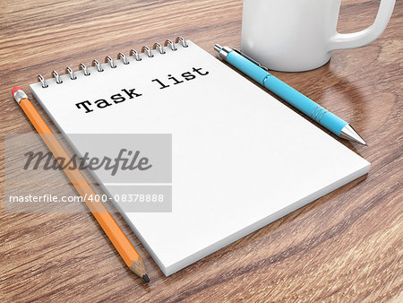 The notepad with the pen lies on a table