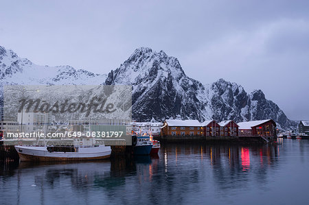 Waterfront harbor and fishing boats at dusk, Svolvaer, Lofoten Islands, Norway