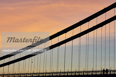 Silhouetted detail of Clifton suspension bridge at sunset, Bristol, UK