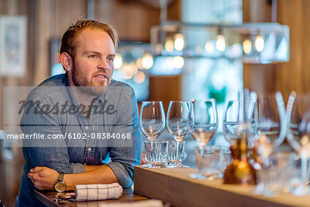 Bartender looking away