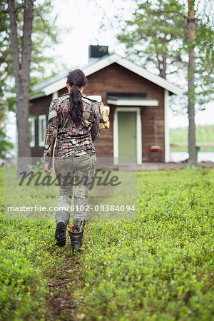 Woman carrying firewood