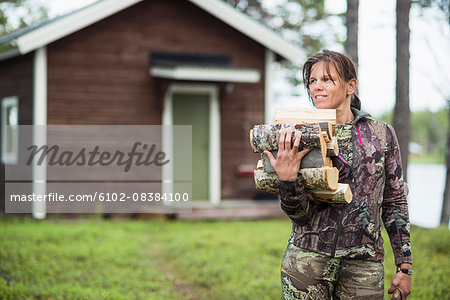 Woman carrying firewood