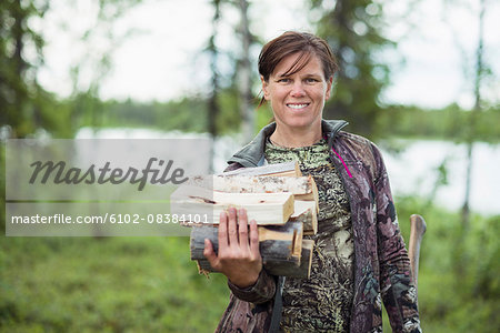 Woman carrying firewood