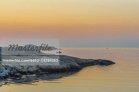 Sunset at rocky coast