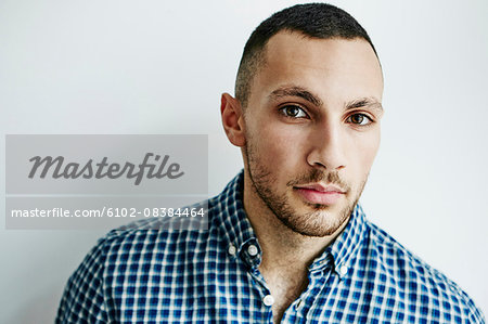 Young man looking at camera