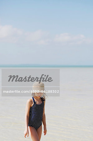 Girl wading in sea