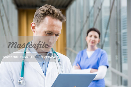 Doctor using his tablet pc