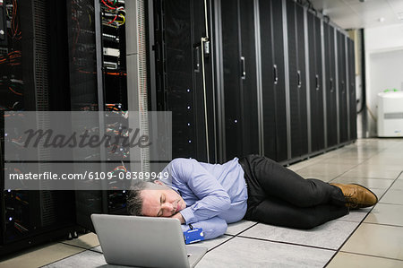 Technician napping in server room