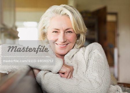 Portrait smiling senior woman in sweater