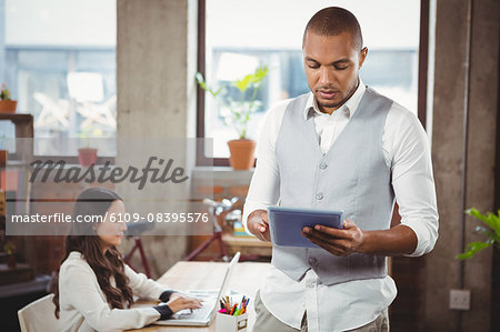 Businessman holding digital tablet