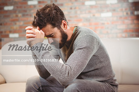 Man with hands clasped Man with hands clasped